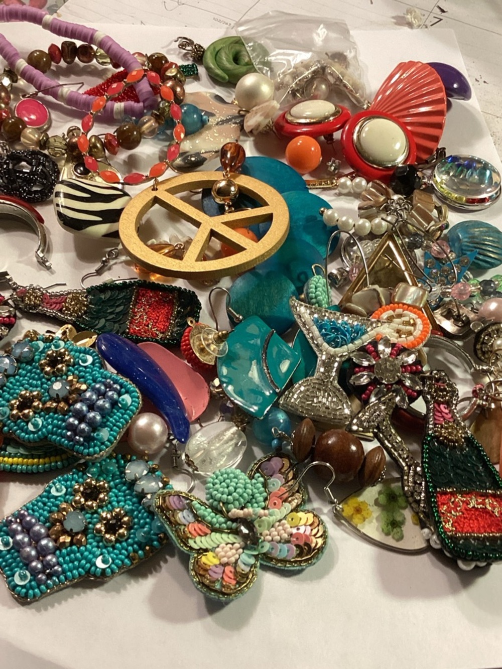 1.5 pounds of costume/vintage jewelry including decorative containers (2)